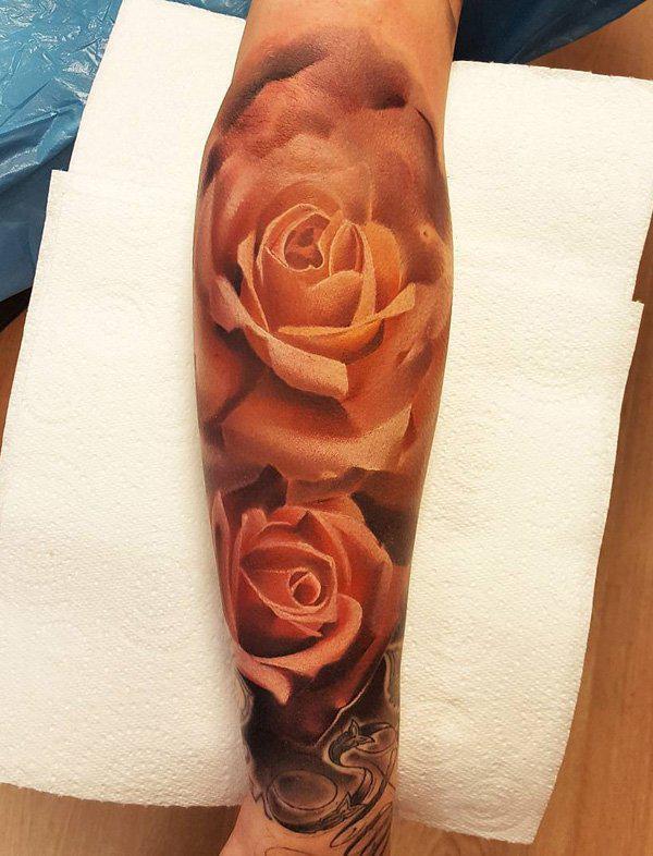 Two yellow roses tattoo