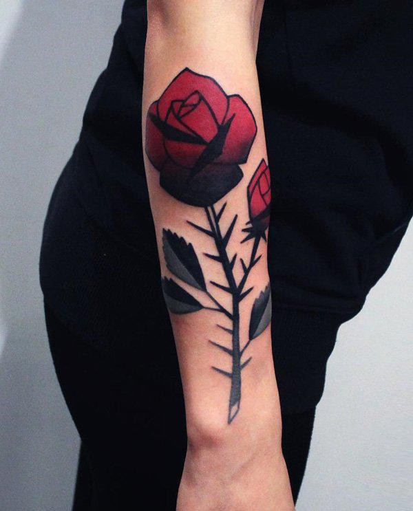 Black skull and rose tattoo on the forearm - Tattoogrid.net