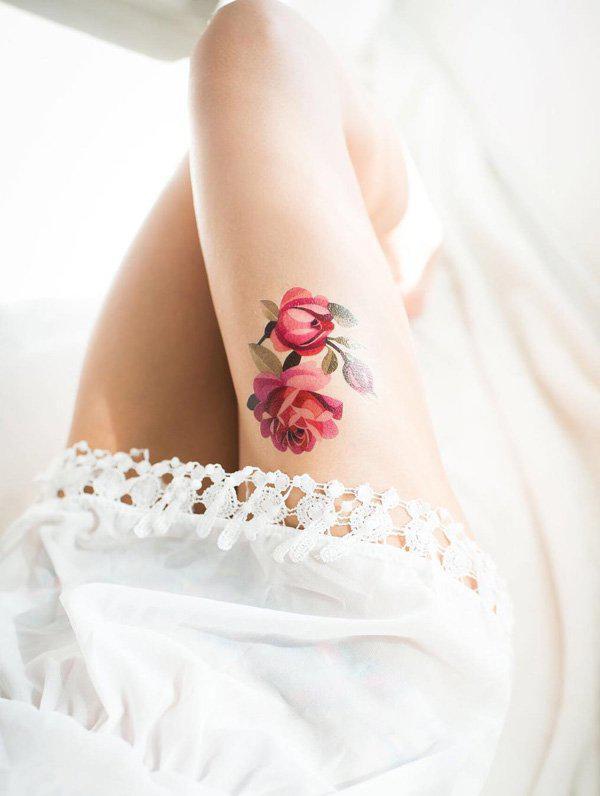 Cute Rose Tattoo on thigh for wonen