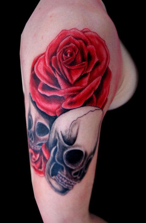  Skull and rose tattoo on arm