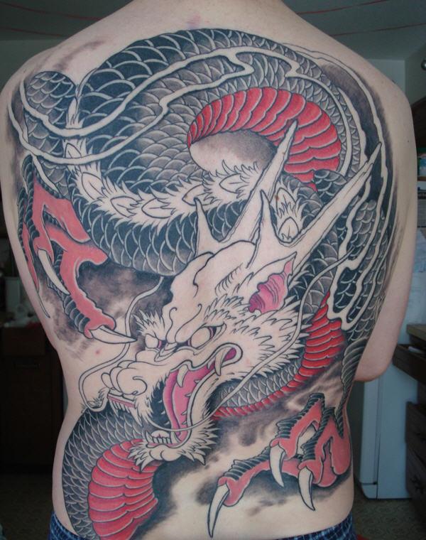 tribal dragon back tattoos for men