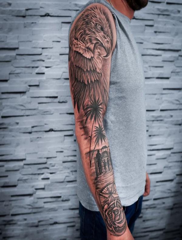 Eagle tattoo on the right upper arm