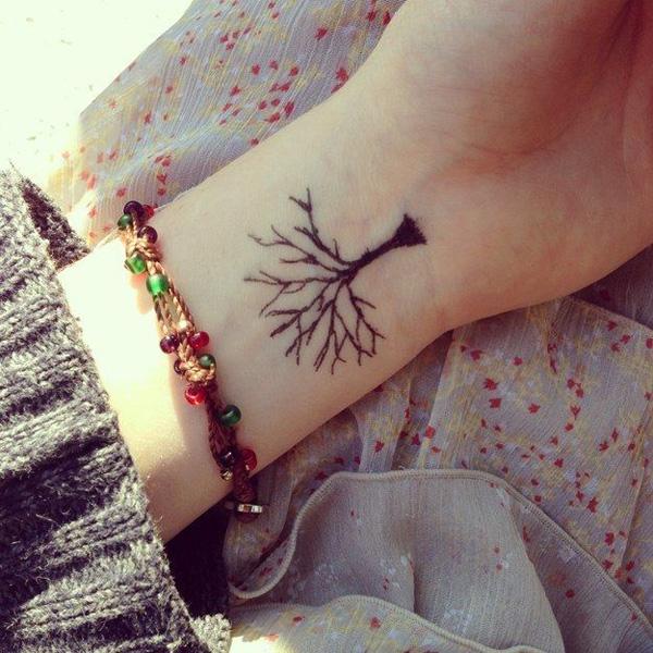 Cosmic Tattoos - Small tree silhouette done by Emily... | Facebook