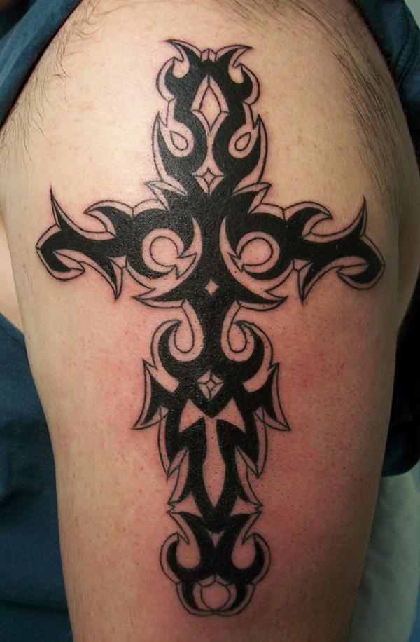tribal cross back tattoos