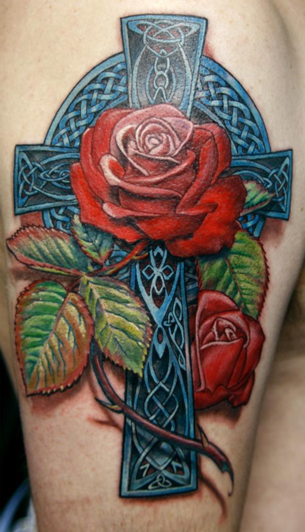 Cross roses and skull  Flower tattoo shoulder Skull thigh tattoos  Lilly flower tattoo