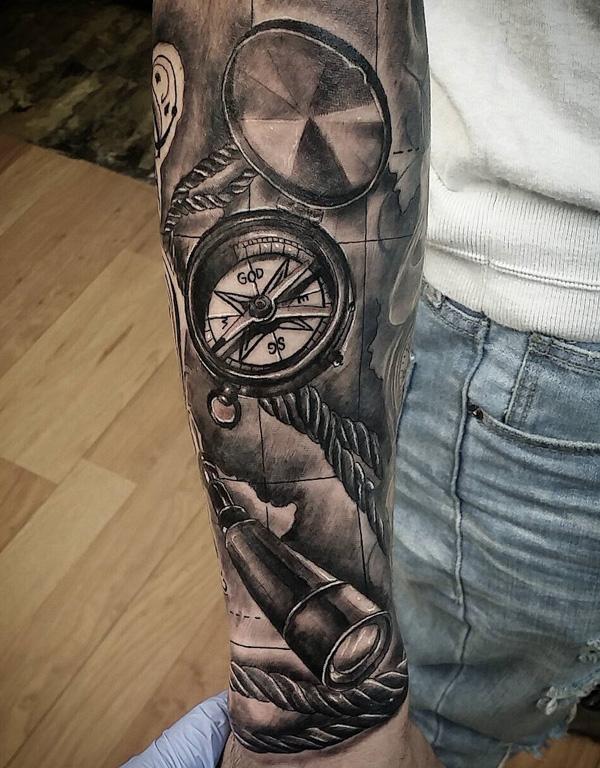 Realistic compass tattoo on sleeve 97