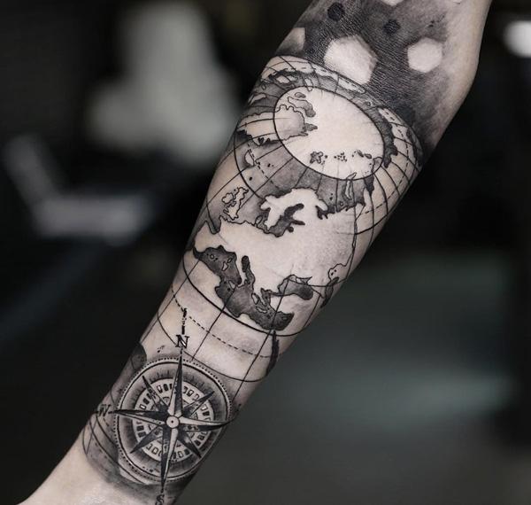 nautical compass tattoo forearm