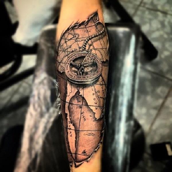World map compass tattoo