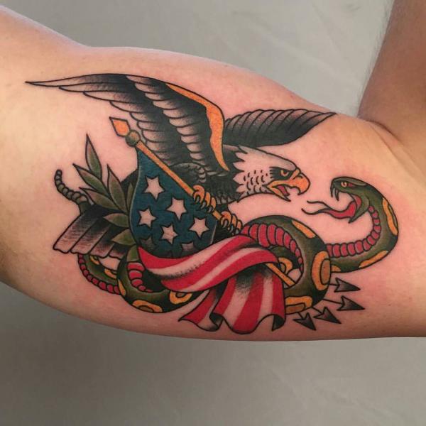 traditional eagle with american flag tattoo