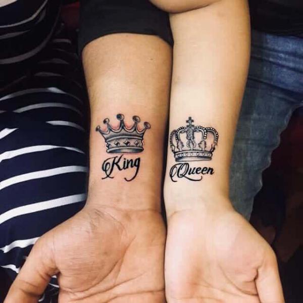 Matching King and Queen crown tattoo for couple
