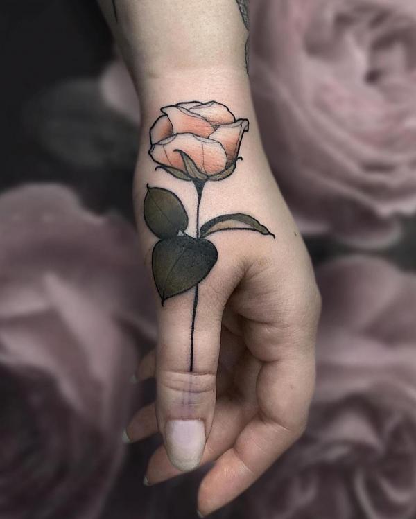 rose tattoo finger