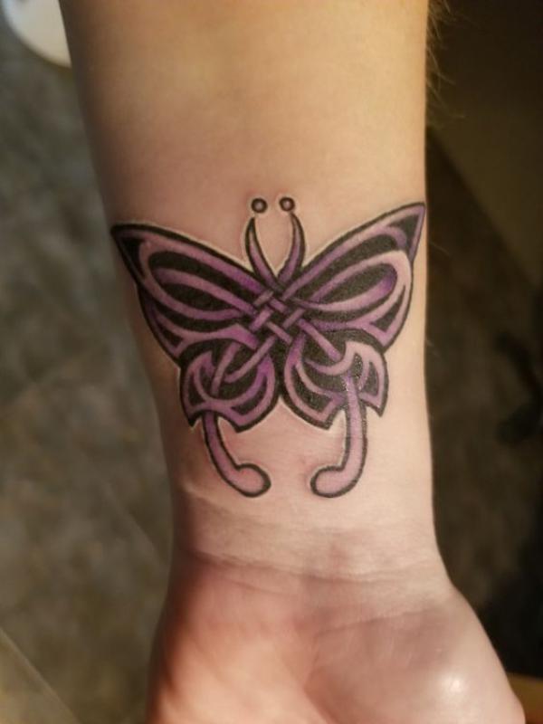 celtic butterfly foot tattoo