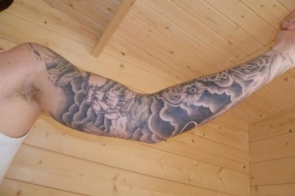 cloud shading on leg in blackgrey shade tattoo