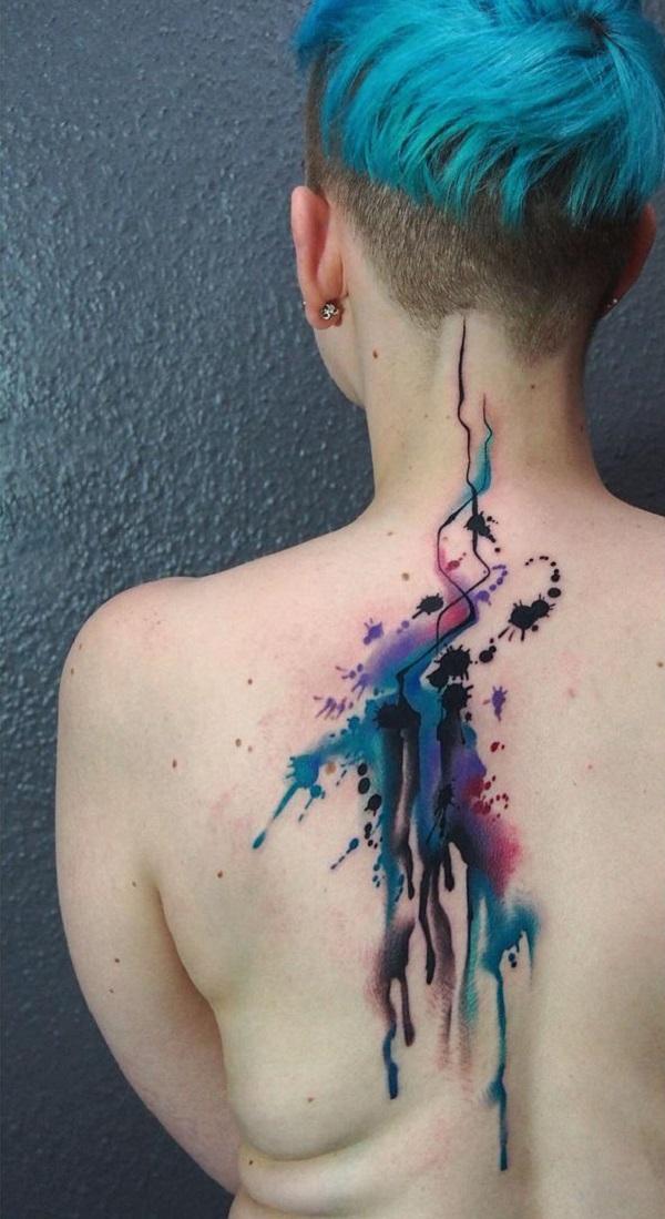 a woman with a tattoo on her back photo  Free Skin Image on Unsplash