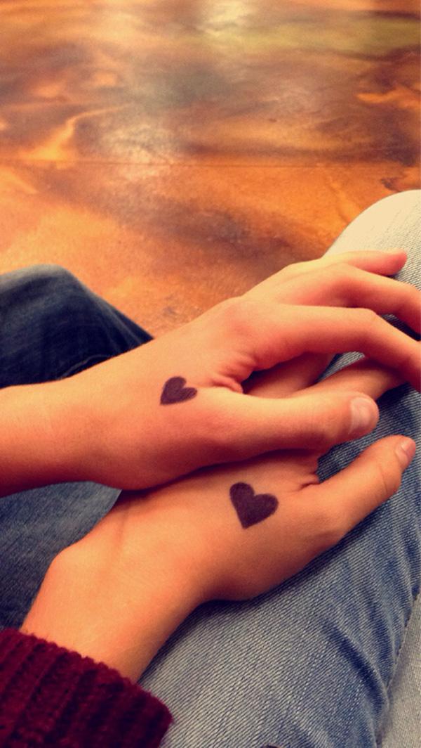 boyfriend and girlfriend matching tattoos hearts