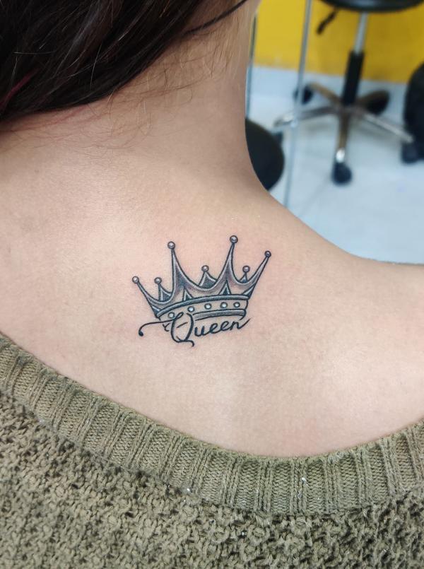 crown tattoos on foot
