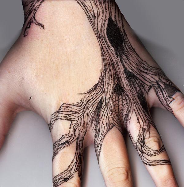 Geometric hand piece by Andrei Svetov  Tattoogridnet