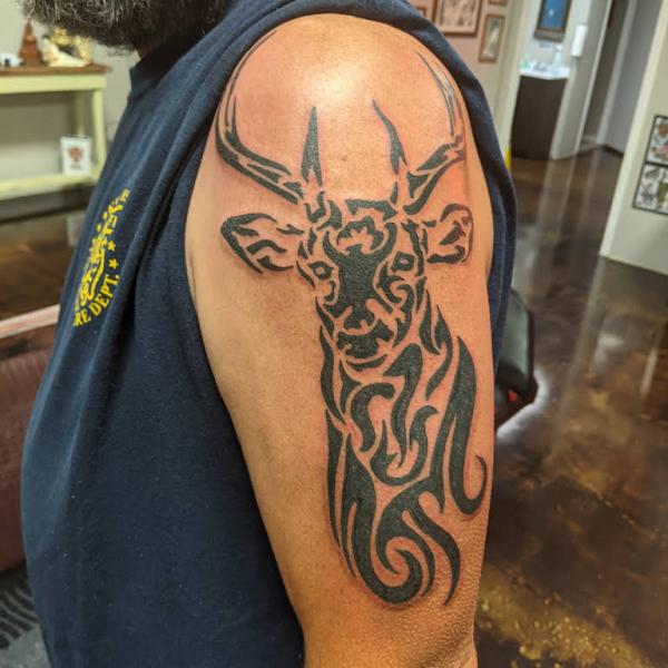tribal deer head tattoos