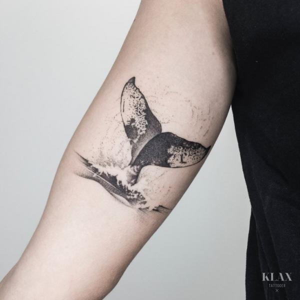 Elegant Whale Tail Tattoo Design