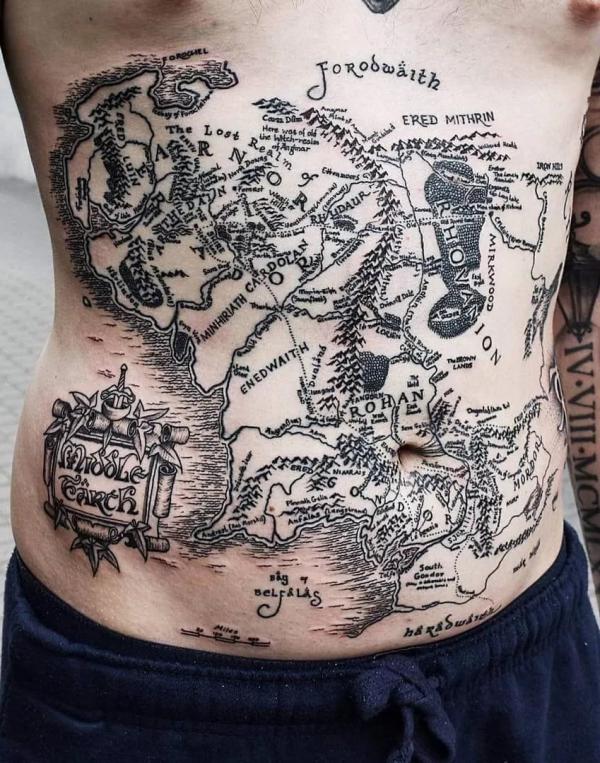 World map tattoo on the upper back.