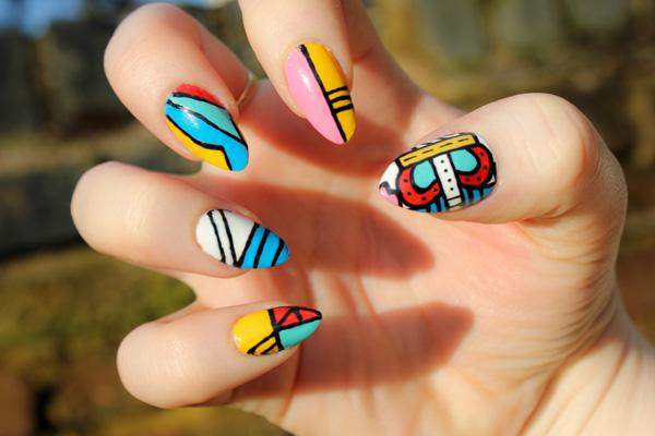 Be bold and be gold. Check out this awesome nail art design which focuses on strong solids and shapes. Each of the nails has different designs adding to the novelty of the nail art fashion. Definitely a must try and you can play along with bright colors such as blue green, white, yellow, red, orange and so much more!