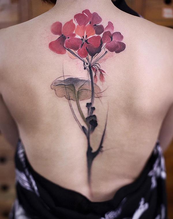 flower spine tattoos