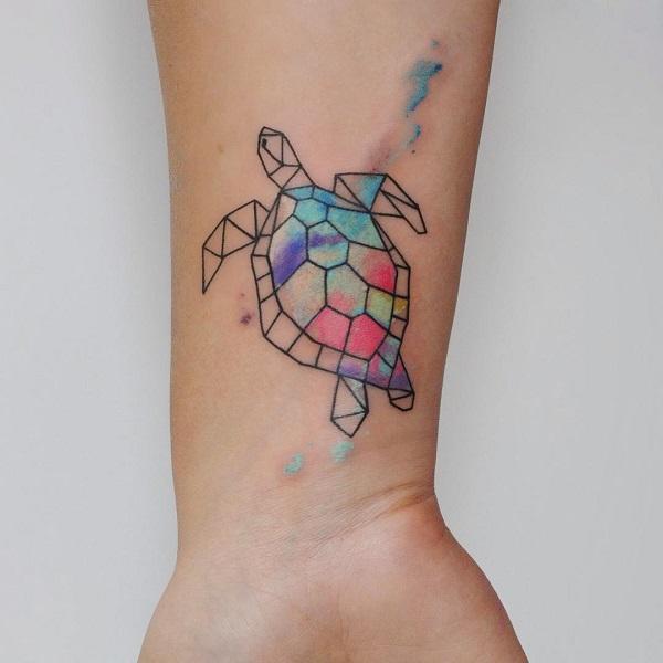 Fine line turtle tattoo on the ankle