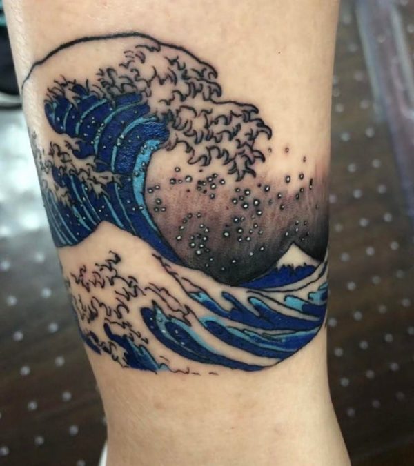 Riding the Waves: Exploring the Beauty of Wave Tattoos | Art and Design