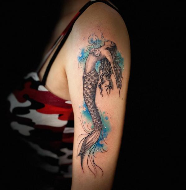 Falling mermaid half sleeve tattoo