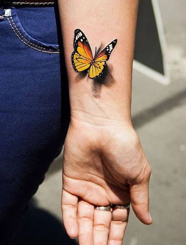 butterfly and stars tattoos on wrist