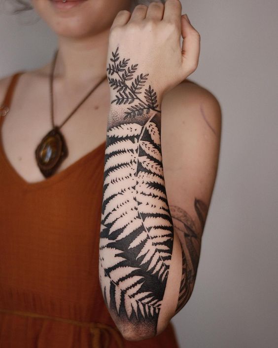 Interesting negative space forearm tattoos to wake up your imagination