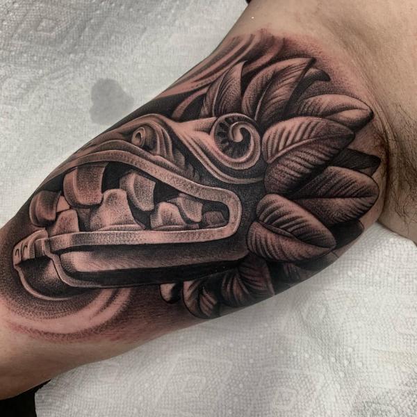 Black Ink Quetzalcoatl Tattoo On Full Sleeve By Spencer Caligiuri