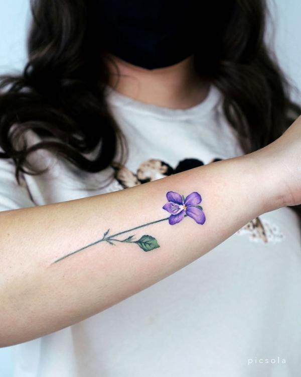 Tattoo tagged with: flower, small, violet, tiny, blue, yellow, pink, little,  nature, shoulder, soltattoo, medium size, green, illustrative, brown |  inked-app.com