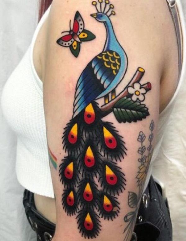 Peacock and butterfly tattoo