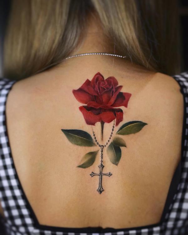 cross with rosary and roses tattoo