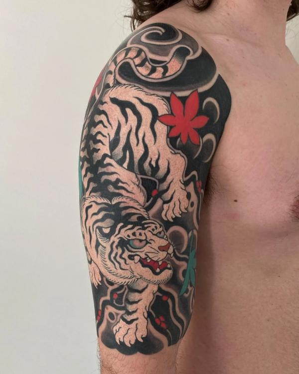 Cover Up Tiger Tattoo on Arm - Ace Tattooz