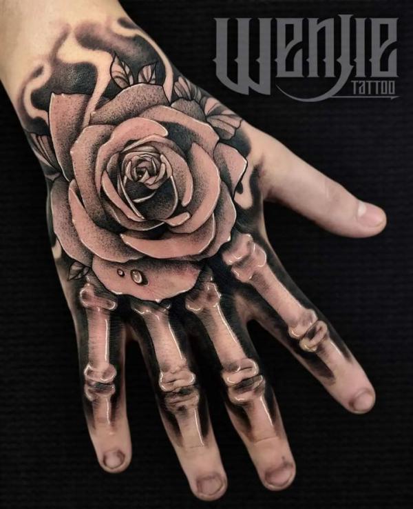 The Art of Ink: The Rose Skeleton Hand Tattoo | Art and Design