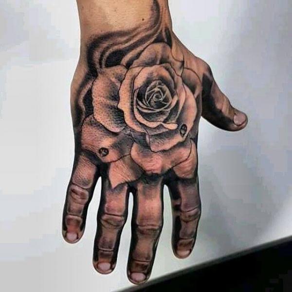 rose tattoo hand