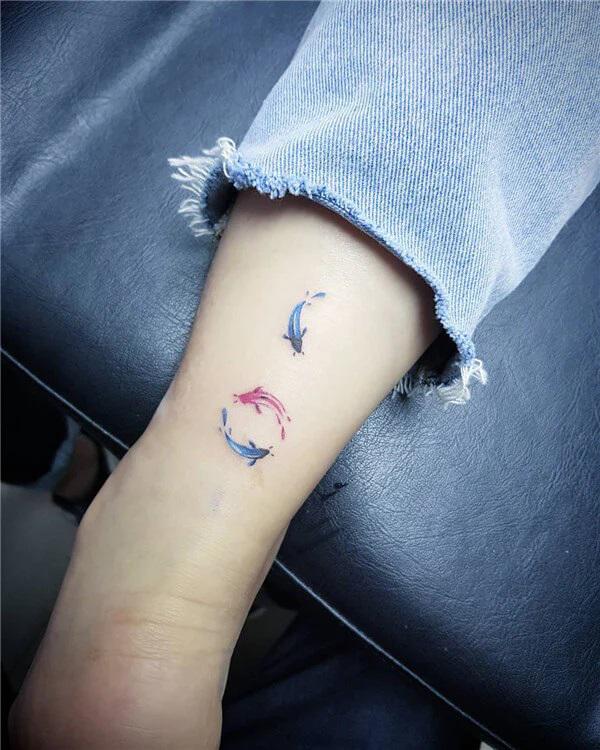 minimalist koi fish tattoo