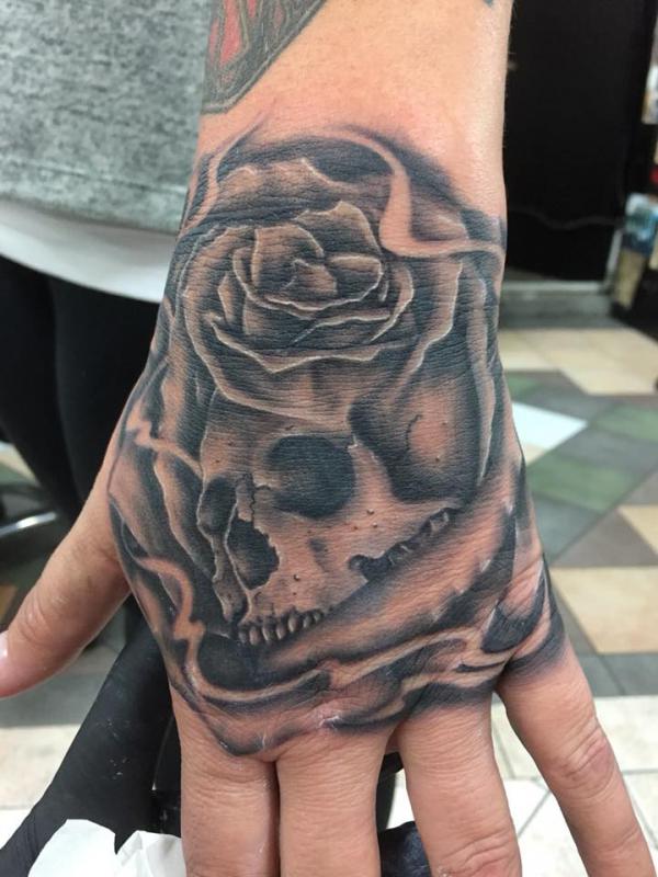 50+ Rose Hand Tattoo Designs with Meanings Art and Design