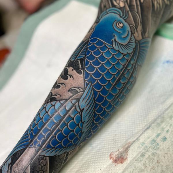 blue koi fish tattoo sleeve