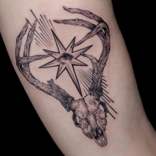 Skull In A Star Tattoo On The Leg Stock Photo, Picture and Royalty Free  Image. Image 4972829.