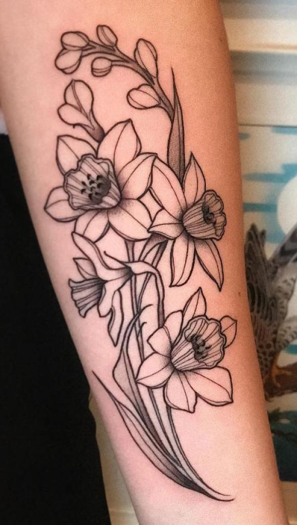 Daffodil flower tattoo by... - Skin Machine Tattoo Studio | Facebook
