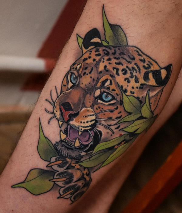 Aztec Jaguar Warrior Tattoo, This tattoo is often depicted in a realism  style.