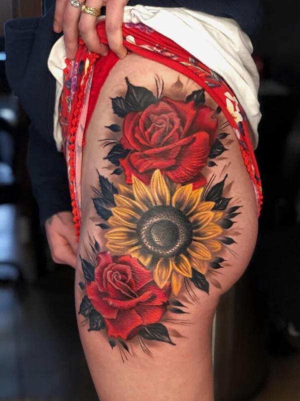 Rose Hip Tattoo - BME: Tattoo, Piercing and Body Modification NewsBME:  Tattoo, Piercing and Body Modification News