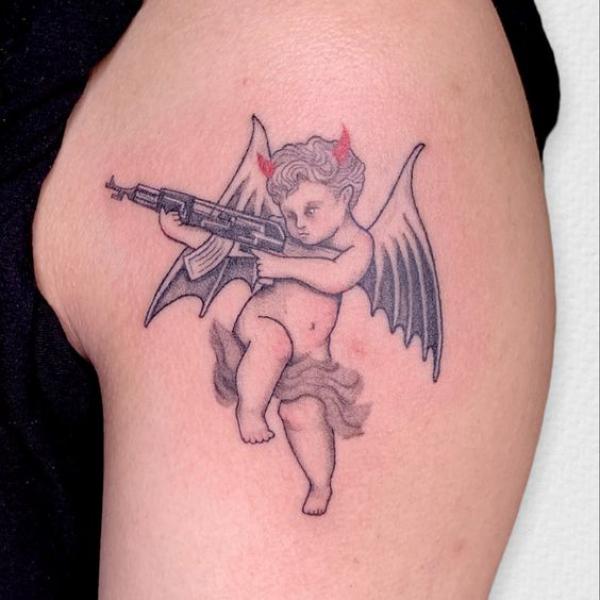 evil cherub tattoos