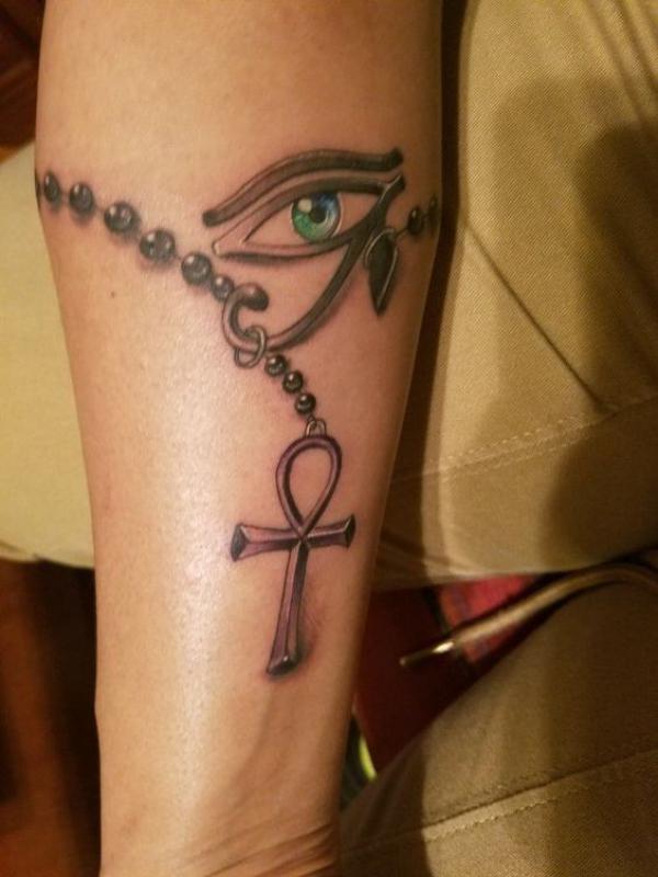 Hi there! I am studying religious anthropology and have decided to finish  my tattoo (the ankh in the center) with some more symbolism. I would like  to make sure my arabic is