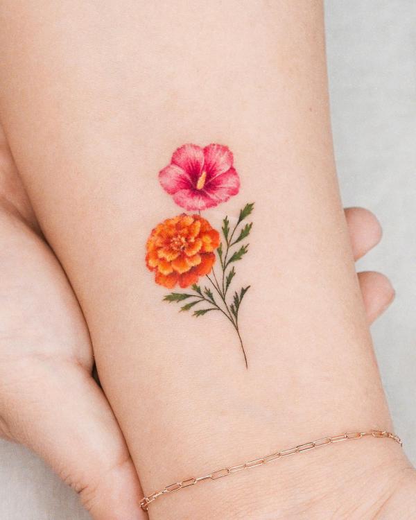 Marigold Tattoo - Tattoo by @danyl_art_tattoo 2127 EAST... | Facebook