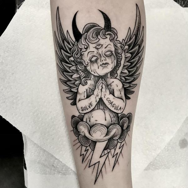 sleeping cherub tattoos