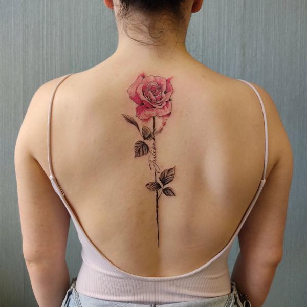 horizontal rose tattoo on back｜TikTok Search